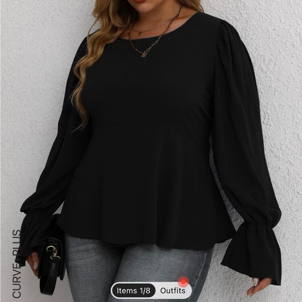 BRAND NEW - black flouncy top. Never worn